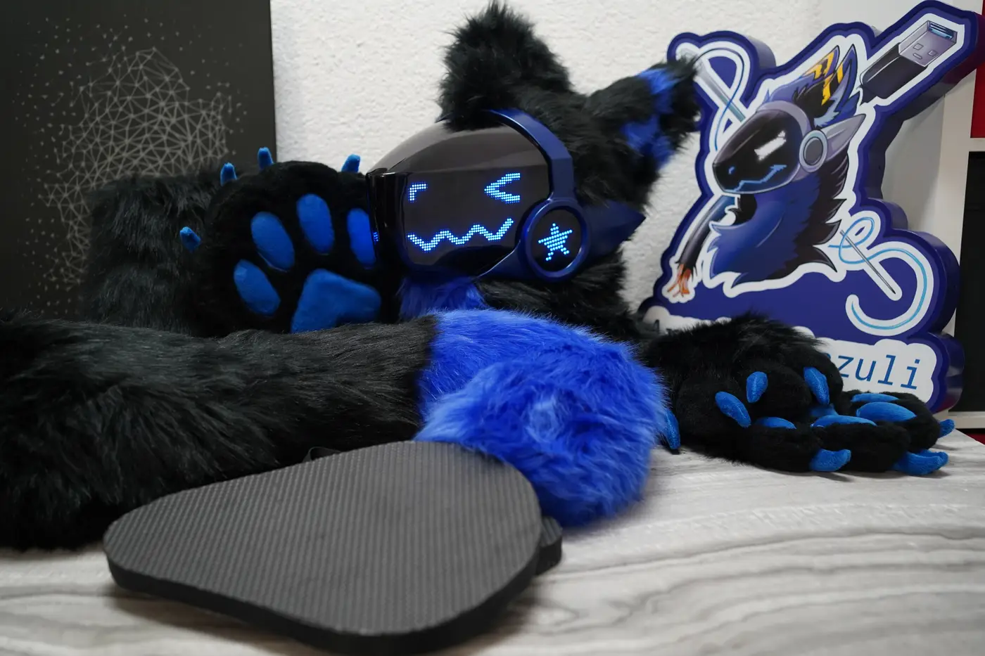Black Protogen head, hand paws, feet paws and blue tipped tail with the Arget and Lazuli logo