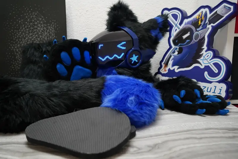 Black Protogen head, hand paws, feet paws and blue tipped tail with the Arget and Lazuli logo