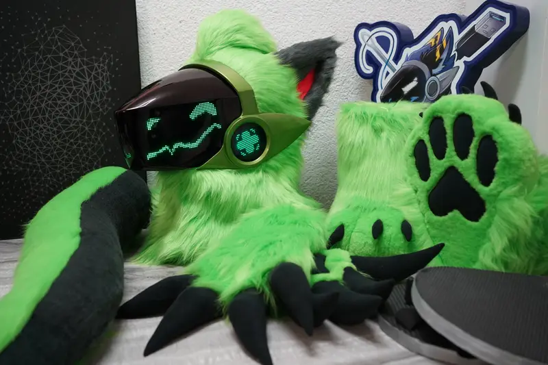 Lime green Protogen partial with the head, a dragon shaped tail, claw hand paws with long black claws and feet paws with their outdoor sole sandals