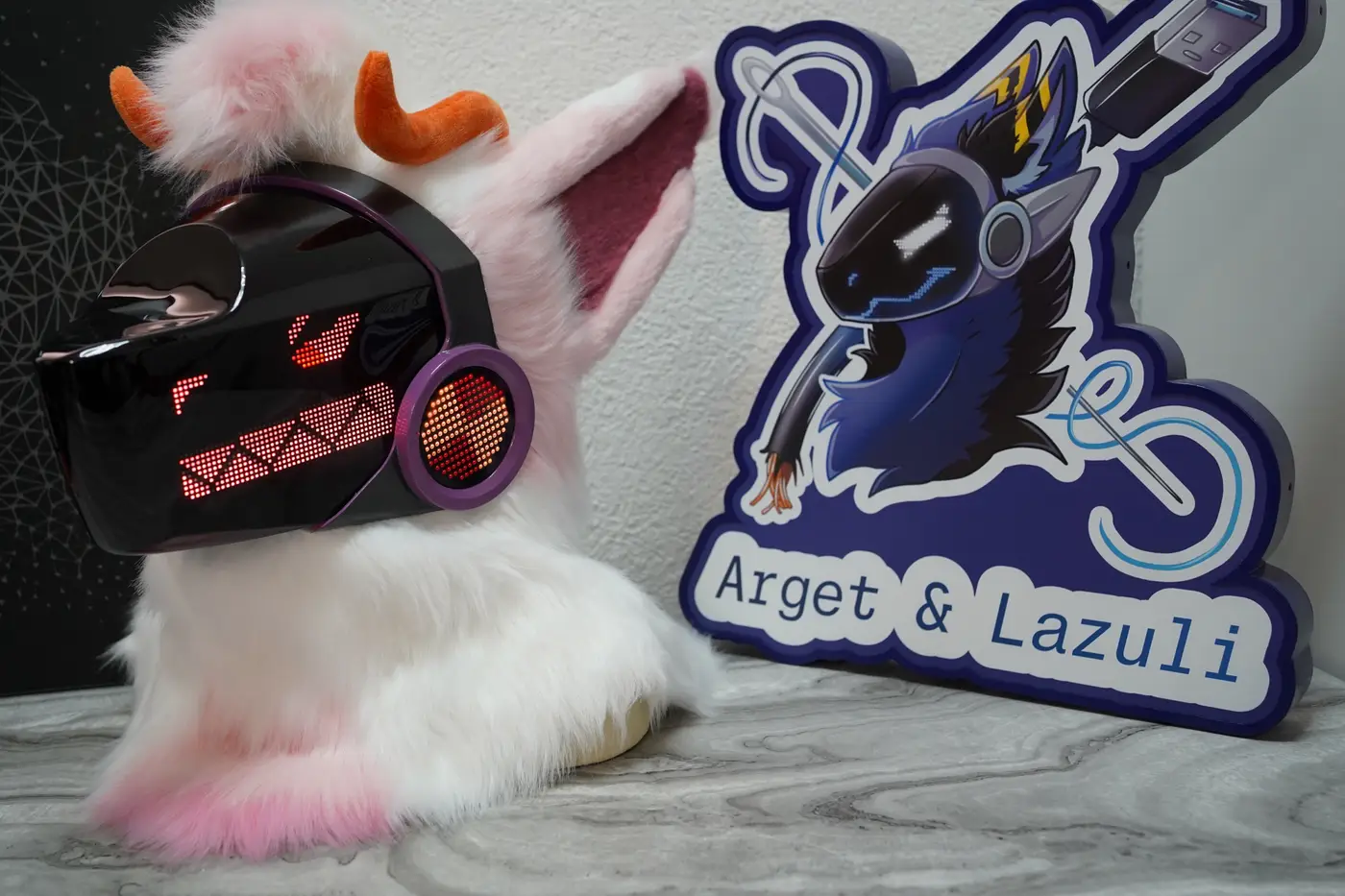 White and pink Protogen head with a red grin and teeth on the LED visor