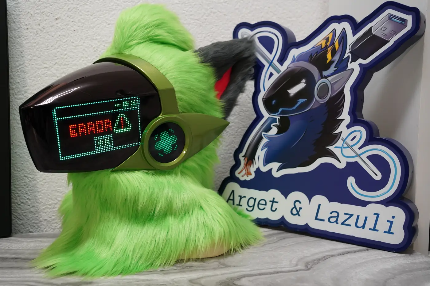 Lime green Protogen head showing a red ERROR window on the black LED visor