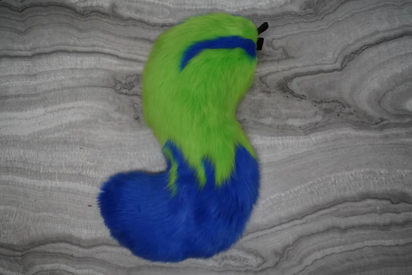 Large lime green canine shaped tail with a blue tip and a blue stripe, hand sewn for the Protogen partial