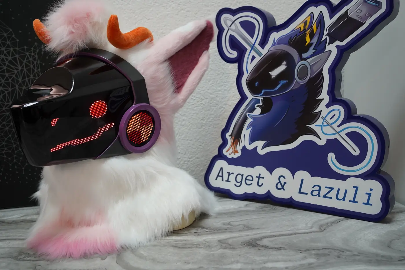 White and pink Protogen head with orange horns above the black LED visor