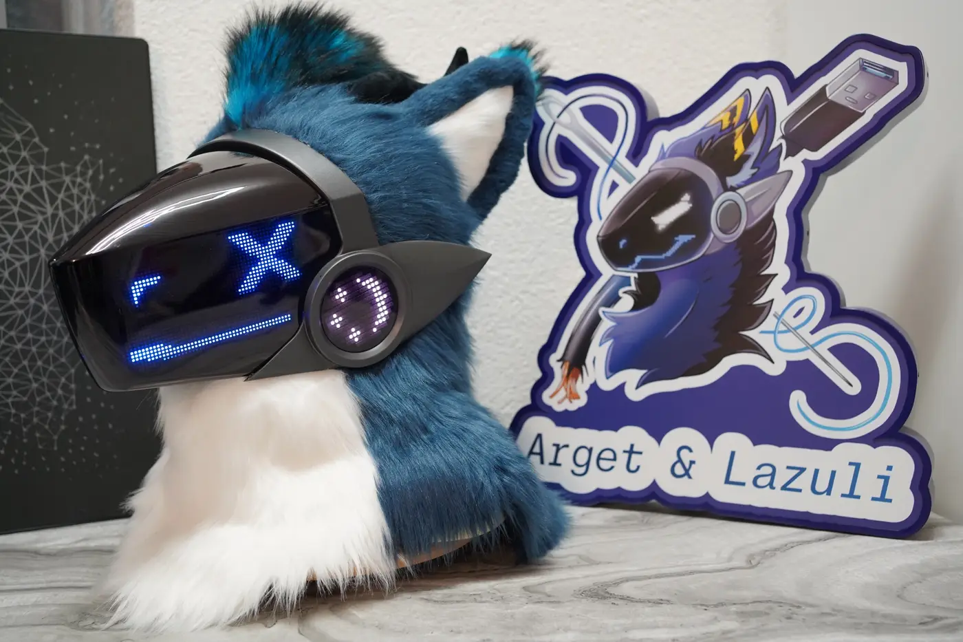 Teal and white Protogen head with one blue eye closed on the LED visor