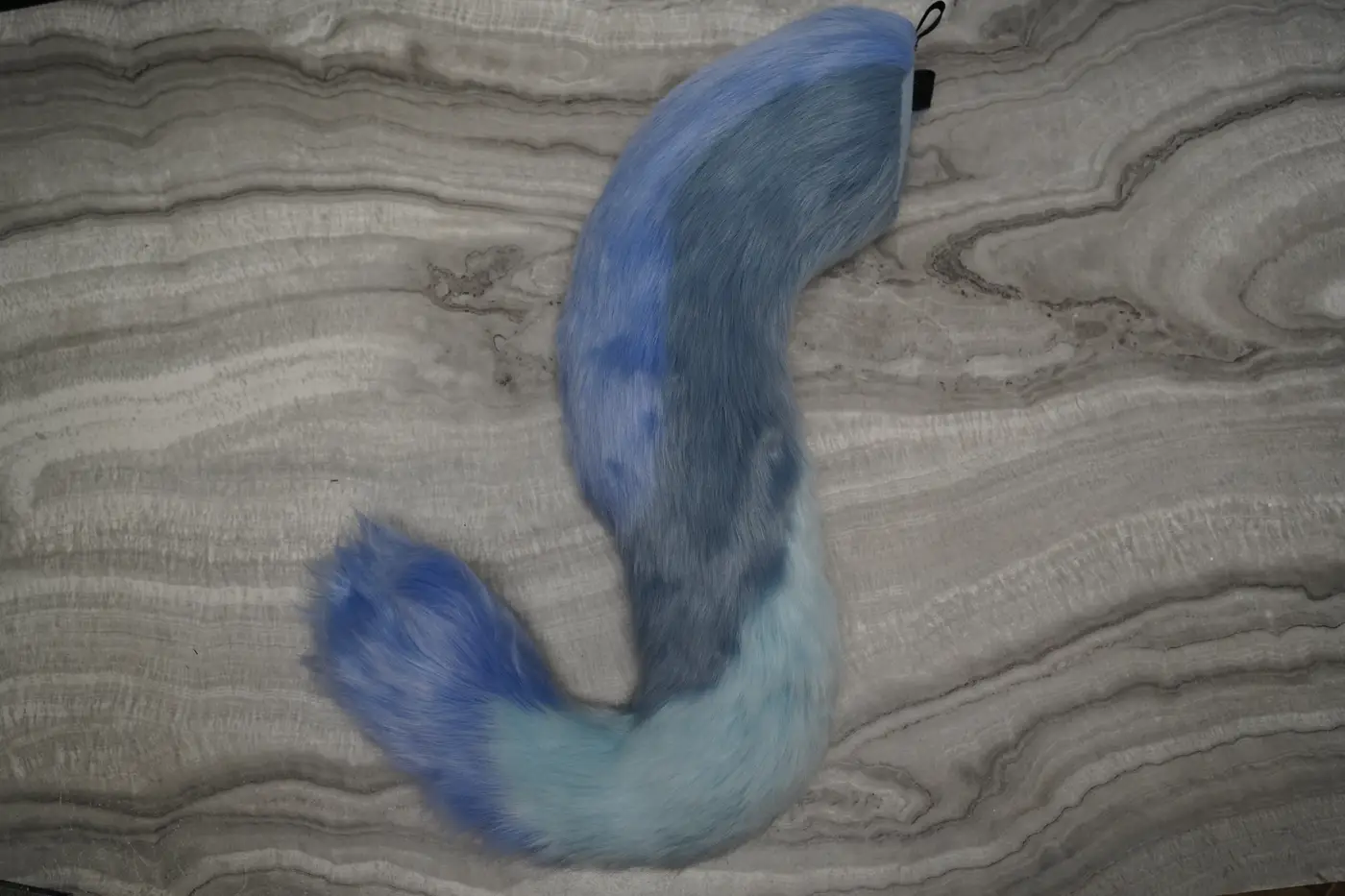 Light blue fursuit tail with darker blue shading for the Protogen partial