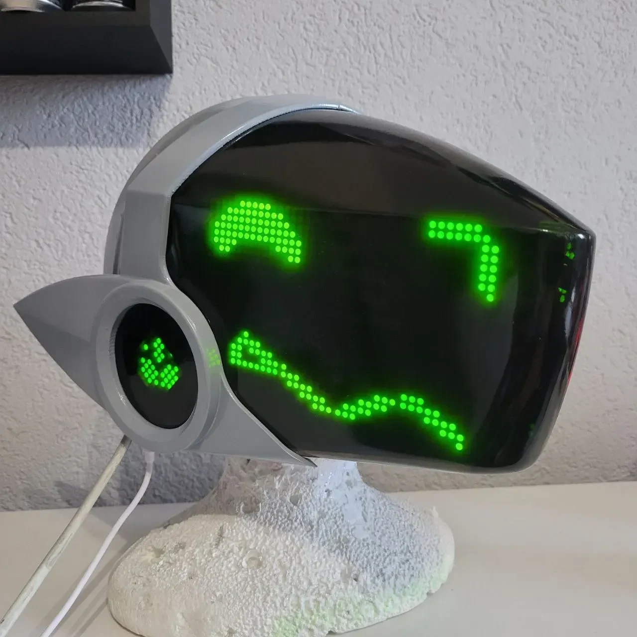 Handmade custom painted Protogen head with a green LED visor, by Arget & Lazuli