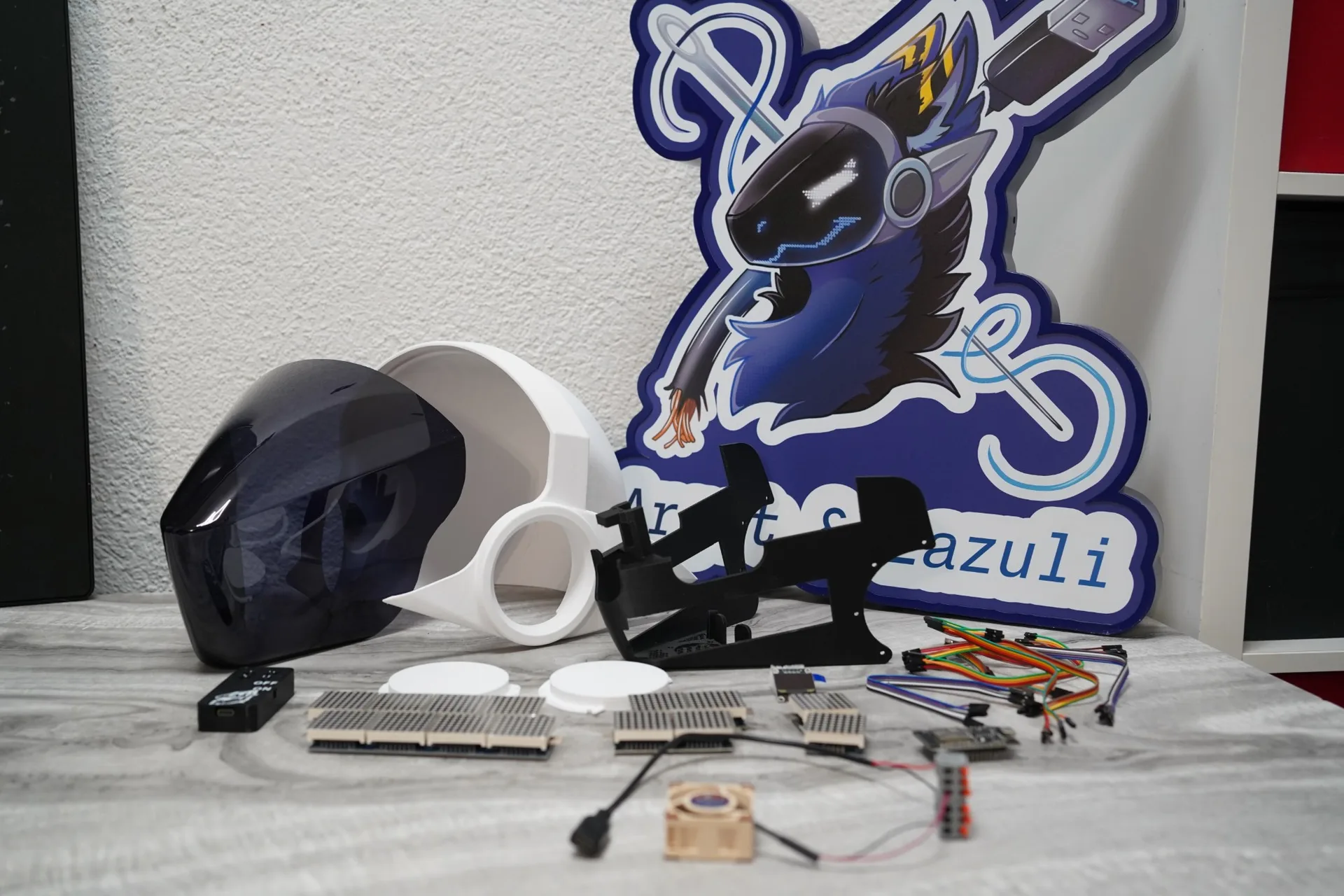 Protogen DIY electronics kit: tinted visor, 3D printed base, LED panels, cooling fan and wiring by Arget & Lazuli