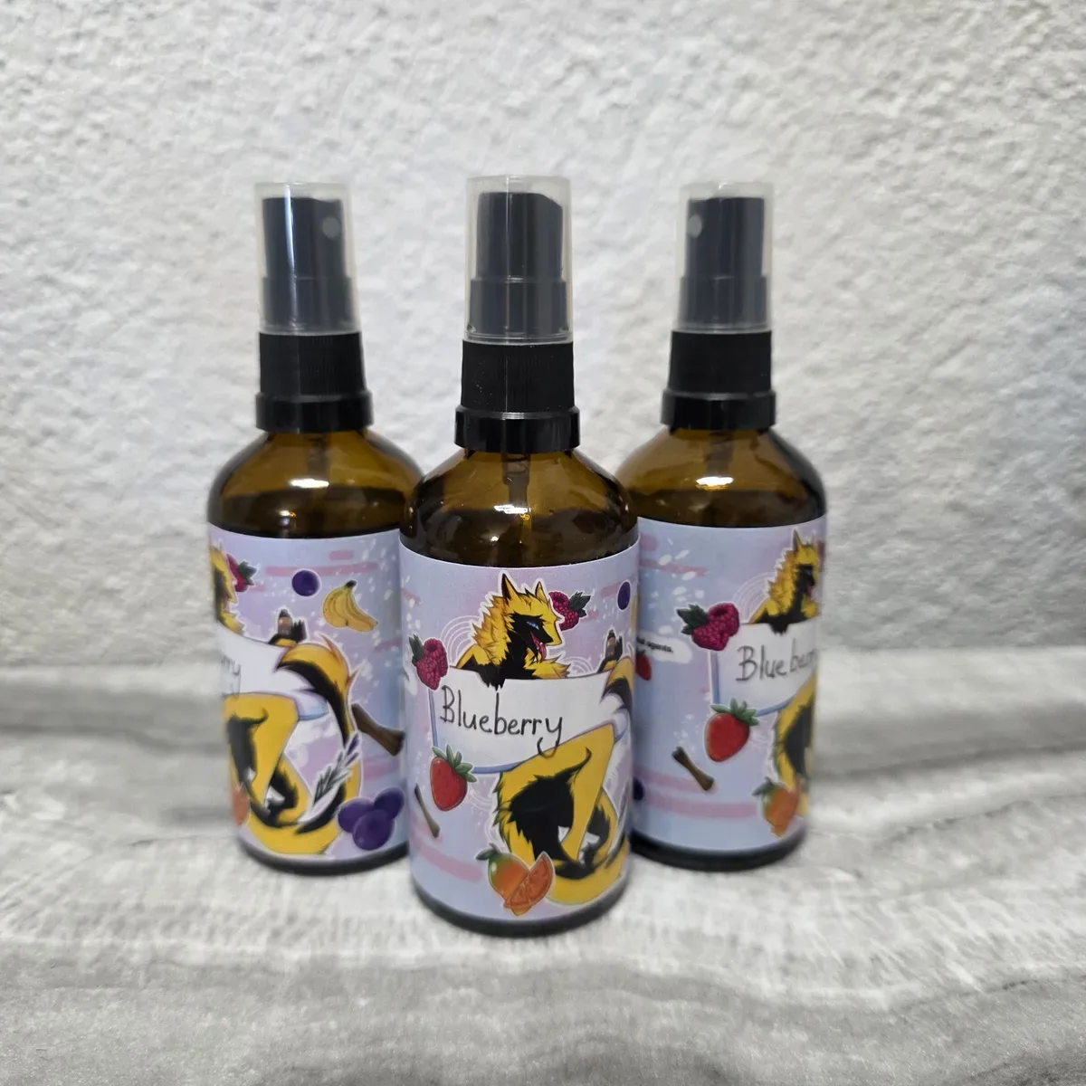 Three handmade Blueberry scented fursuit refresher spray bottles, by Arget & Lazuli