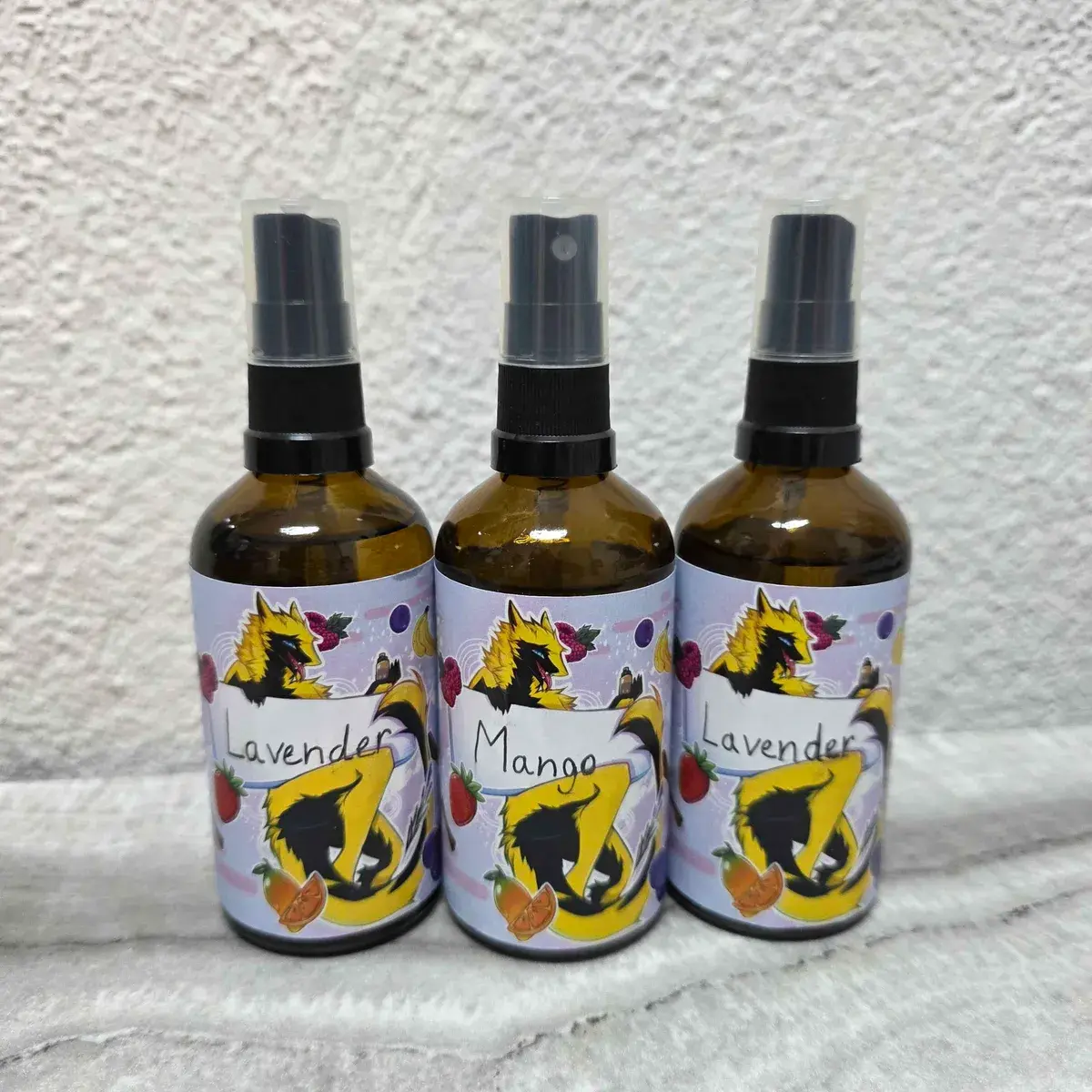 Handmade Lavender and Mango scented fursuit refresher spray bottles, by Arget & Lazuli